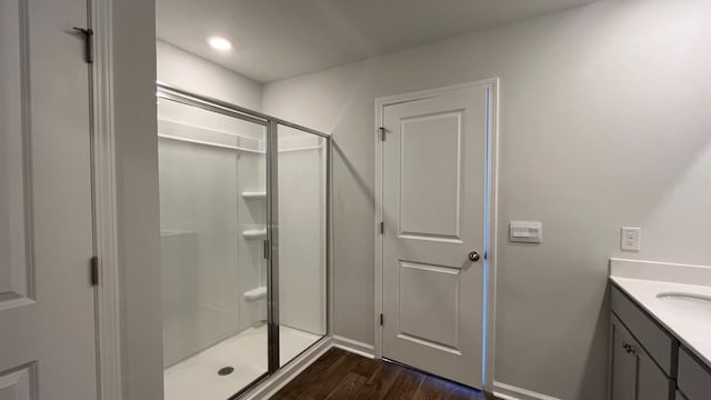 158 Yarrow Way, Moncks Corner, SC 29461 - bathroom with vanity, baseboards, wood finished floors, and a shower stall