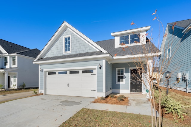 view of front of property featuring a garage