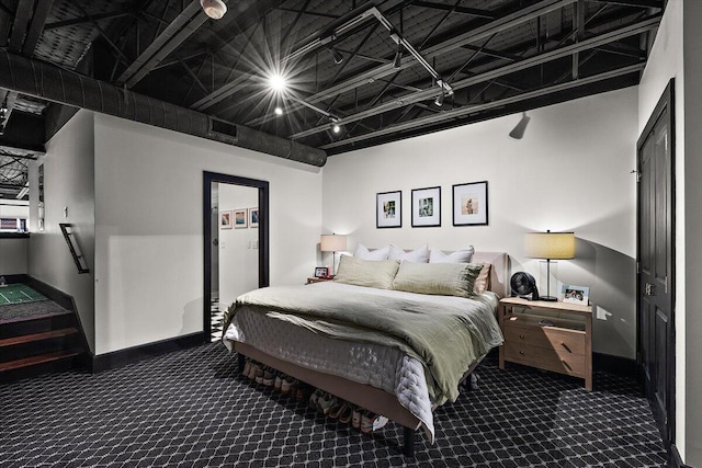 bedroom featuring carpet floors and visible vents