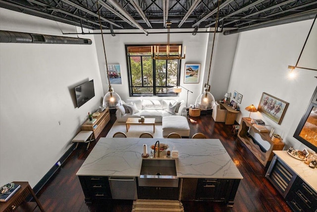living area with hardwood / wood-style flooring
