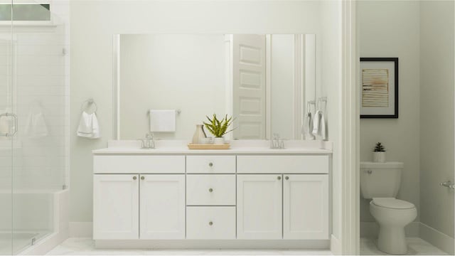 bathroom with vanity, a shower with shower door, and toilet