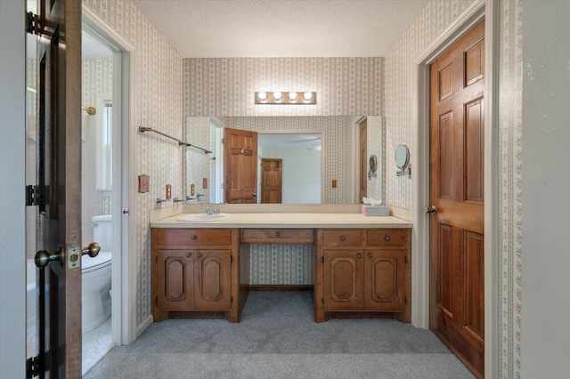 2912 Doncaster Dr, Charleston, SC 29414 - bathroom featuring wallpapered walls, toilet, and vanity