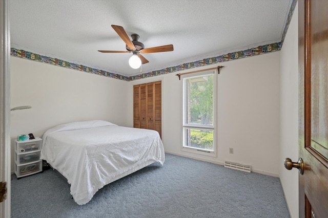 2912 Doncaster Dr, Charleston, SC 29414 - carpeted bedroom with a closet and a ceiling fan