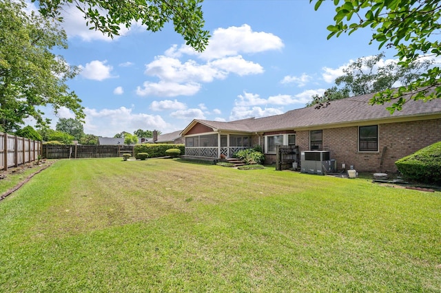 2912 Doncaster Dr, Charleston, SC 29414 - view of yard featuring a sunroom and cooling unit