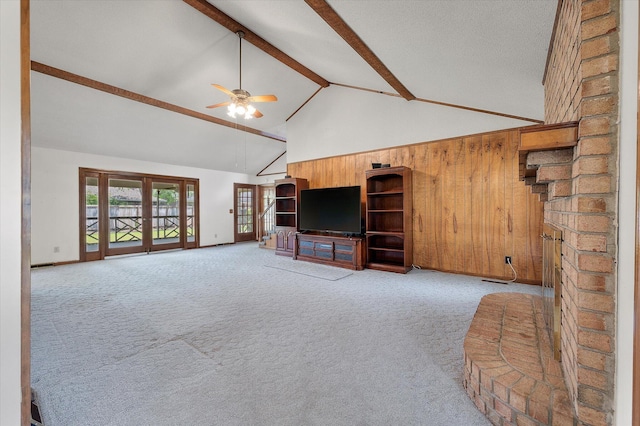 2912 Doncaster Dr, Charleston, SC 29414 - unfurnished living room with a ceiling fan, beamed ceiling, light carpet, and high vaulted ceiling