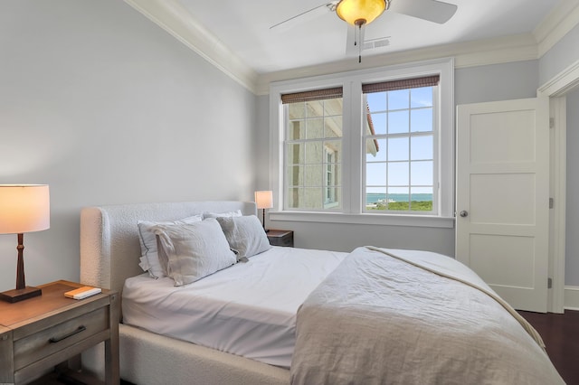 1 King Unit 702, Charleston, SC 29401 - bedroom with crown molding, a ceiling fan, and wood finished floors