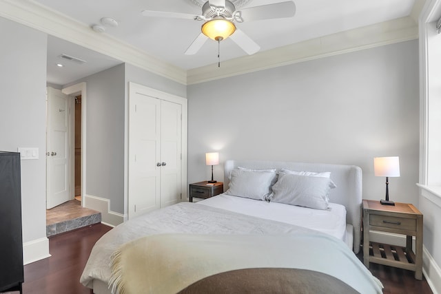 1 King Unit 702, Charleston, SC 29401 - bedroom with wood finished floors, crown molding, recessed lighting, a closet, and ceiling fan