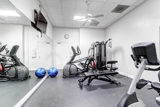 1 King Unit 702, Charleston, SC 29401 - workout area with ceiling fan and a paneled ceiling