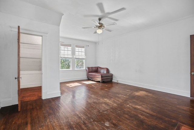 unfurnished room featuring ceiling fan and dark hardwood / wood-style flooring