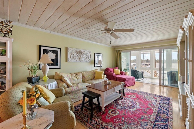 living room featuring light wood-type flooring, ceiling fan, ornamental molding, and wood ceiling