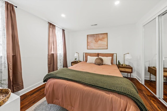 bedroom featuring hardwood / wood-style flooring