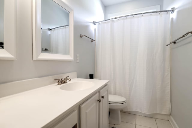 full bathroom with tile patterned floors, vanity, and toilet
