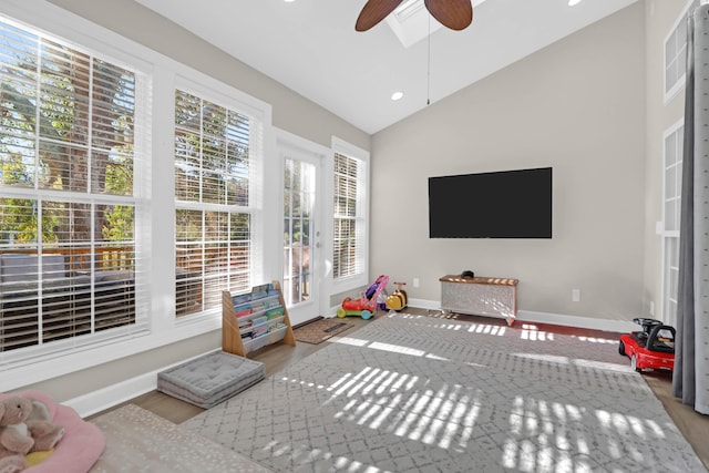 sunroom / solarium featuring vaulted ceiling