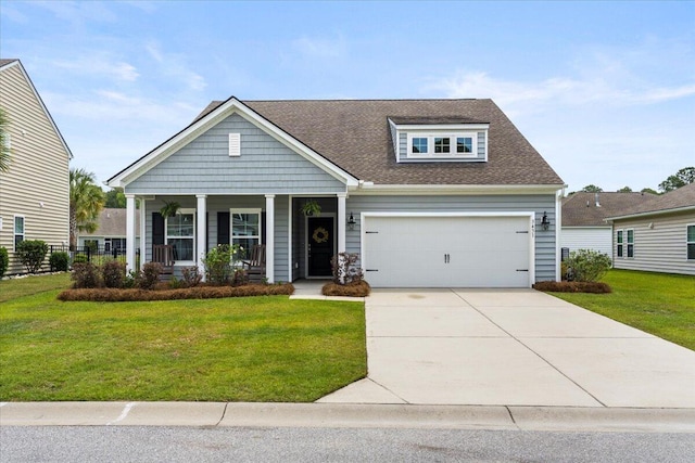 3431 Great Egret Dr, Johns Island, SC 29455 - view of front of property with covered porch, a front yard, a garage, concrete driveway, and a shingled roof