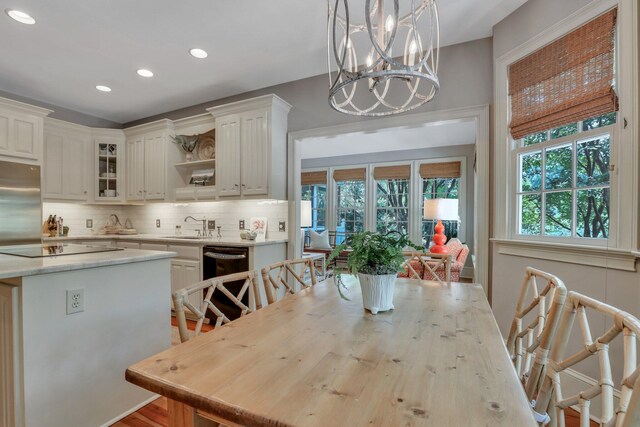 sunroom with lofted ceiling with beams