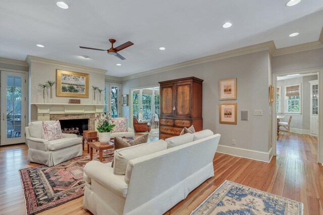 kitchen with light stone countertops, light hardwood / wood-style flooring, and double oven