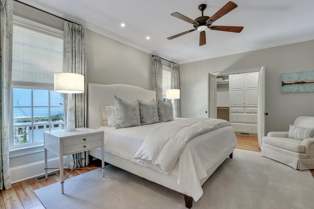 living room featuring light colored carpet and ceiling fan