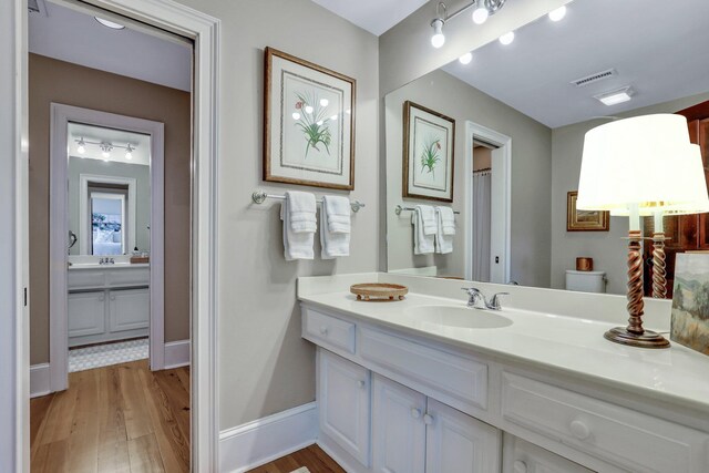 spacious closet featuring light hardwood / wood-style floors