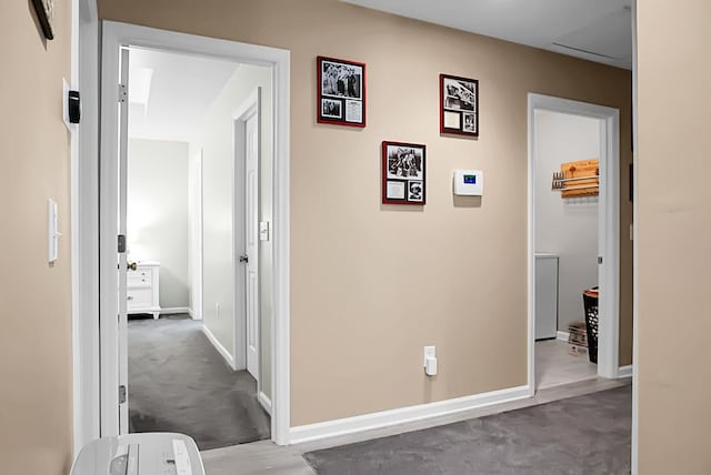 hallway with light carpet