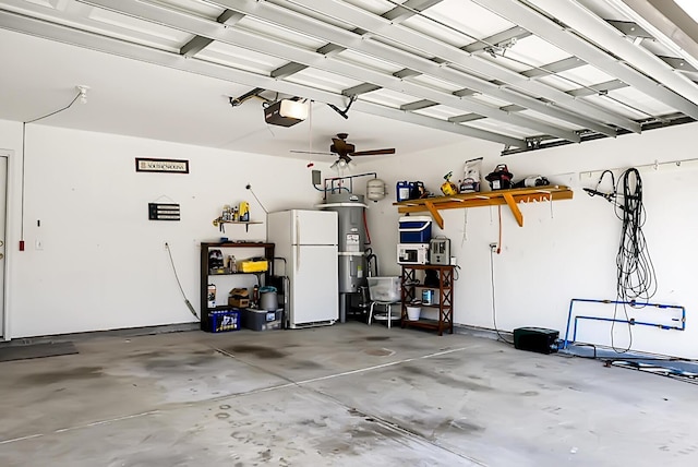 garage featuring ceiling fan, white refrigerator, a garage door opener, and water heater