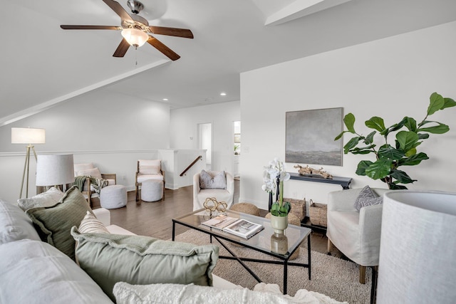 living room featuring ceiling fan and wood-type flooring