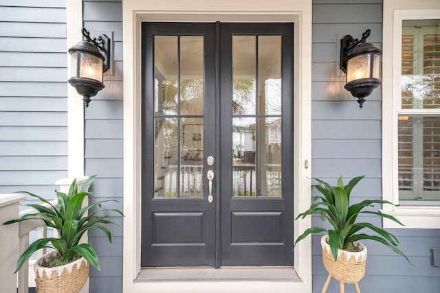 entrance to property featuring french doors