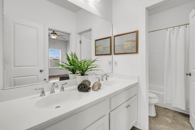 full bathroom with toilet, ceiling fan, shower / bath combo, and vanity