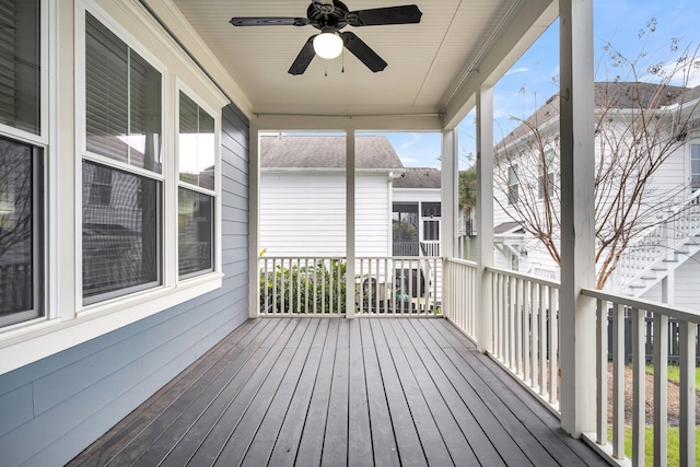 exterior space featuring a porch and ceiling fan