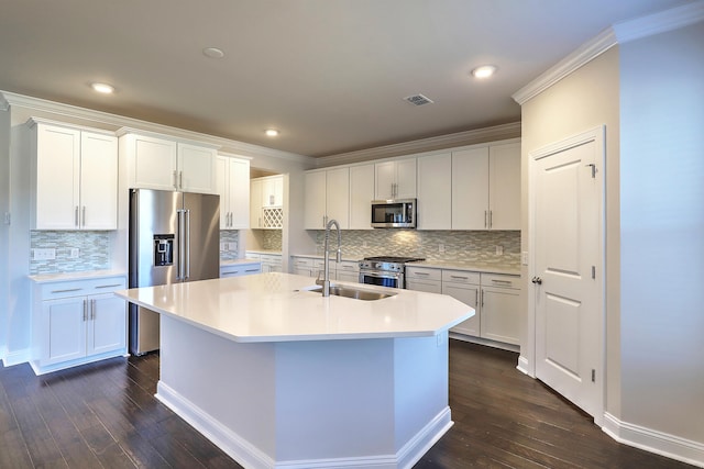 kitchen with dark hardwood / wood-style flooring, white cabinetry, sink, and high end appliances