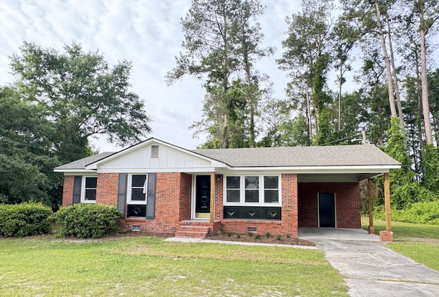 105 Dandridge Rd, Walterboro, SC 29488 - ranch-style home featuring brick siding, a front lawn, driveway, and an attached carport