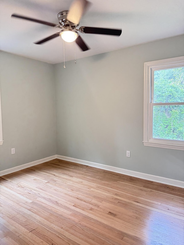 105 Dandridge Rd, Walterboro, SC 29488 - unfurnished room featuring light wood-style flooring, ceiling fan, and baseboards