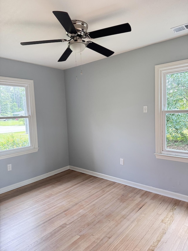 105 Dandridge Rd, Walterboro, SC 29488 - spare room featuring light wood-type flooring, baseboards, and a ceiling fan