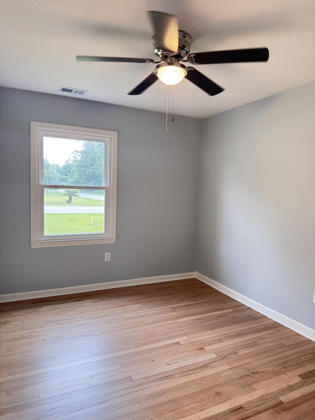 105 Dandridge Rd, Walterboro, SC 29488 - spare room with a ceiling fan, light wood-style floors, and baseboards
