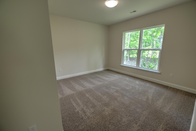 view of carpeted spare room