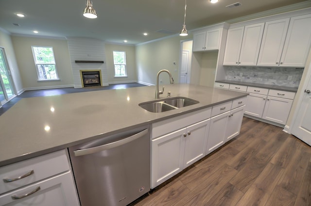 kitchen with pendant lighting, sink, dishwasher, dark hardwood / wood-style floors, and white cabinets