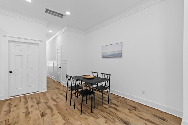 1917 Jason St, North Charleston, SC 29406 - dining room featuring baseboards, visible vents, ornamental molding, and light wood-type flooring