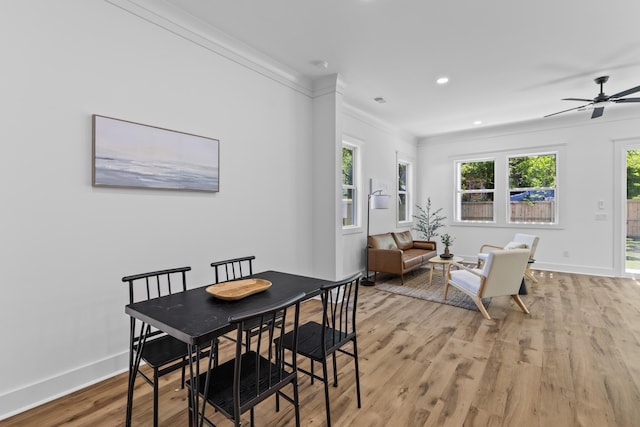 1917 Jason St, North Charleston, SC 29406 - dining area with baseboards, ornamental molding, light wood finished floors, and ceiling fan
