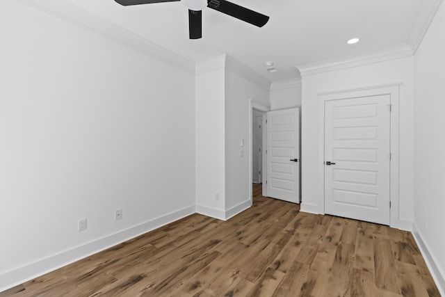 1917 Jason St, North Charleston, SC 29406 - unfurnished bedroom with baseboards, ornamental molding, wood finished floors, and recessed lighting
