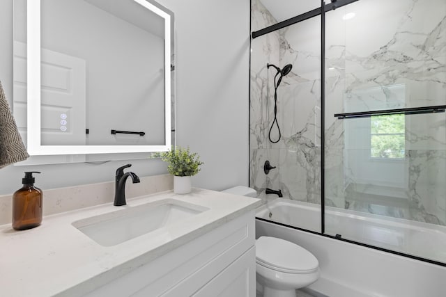 1917 Jason St, North Charleston, SC 29406 - bathroom with toilet, shower / bath combination with glass door, and vanity