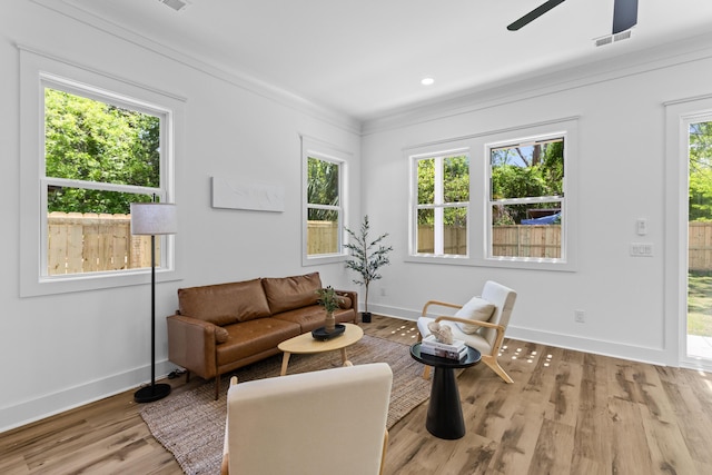 1917 Jason St, North Charleston, SC 29406 - living room with ceiling fan, visible vents, crown molding, wood finished floors, and baseboards