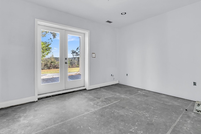 empty room featuring french doors