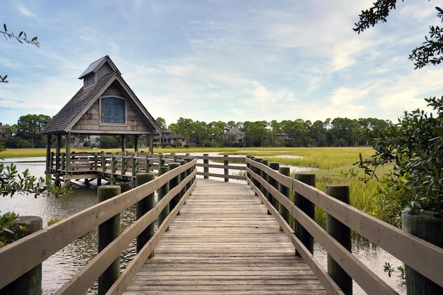 dock area with a water view