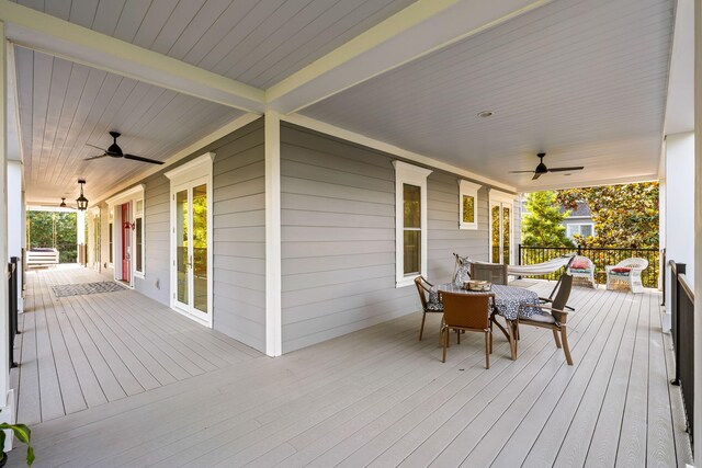 2213 Rolling Dune Rd, Seabrook Island, SC 29455 - wooden terrace with ceiling fan and outdoor dining area
