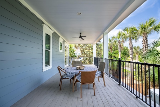 2213 Rolling Dune Rd, Seabrook Island, SC 29455 - wooden terrace featuring a ceiling fan and outdoor dining space