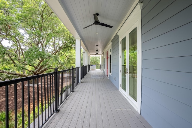 2213 Rolling Dune Rd, Seabrook Island, SC 29455 - wooden terrace with a ceiling fan and french doors