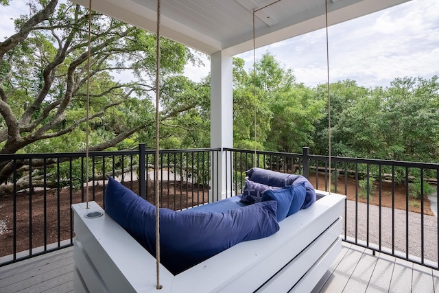 2213 Rolling Dune Rd, Seabrook Island, SC 29455 - wooden deck featuring an outdoor hangout area and view of scattered trees
