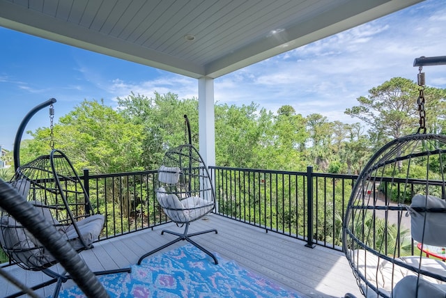 2213 Rolling Dune Rd, Seabrook Island, SC 29455 - wooden deck featuring view of scattered trees