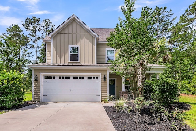 5725 Caviar Ct, Johns Island, SC 29455 - view of front of house featuring board and batten siding, an attached garage, concrete driveway, roof with shingles, and covered porch