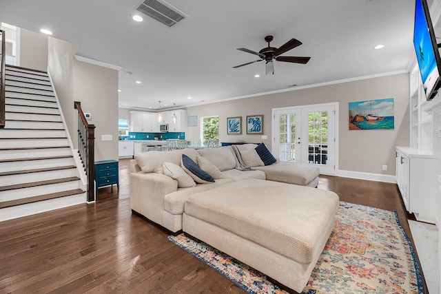 5725 Caviar Ct, Johns Island, SC 29455 - living area featuring crown molding, stairway, dark wood finished floors, recessed lighting, and ceiling fan