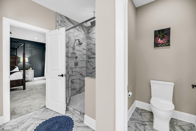 5725 Caviar Ct, Johns Island, SC 29455 - bathroom featuring a shower stall, toilet, ensuite bath, and baseboards